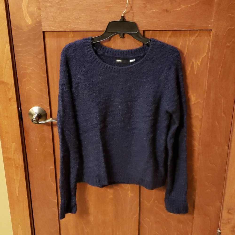 Navy blue sweater with tan elbow pads